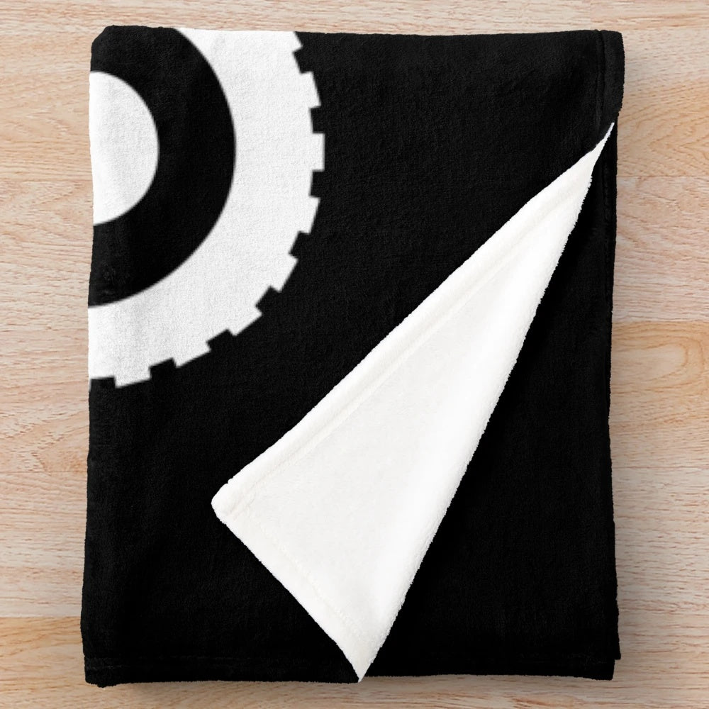 Monster truck silhouette design on a plush, cozy blanket