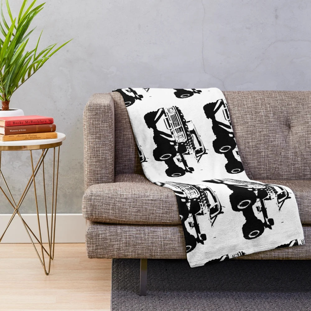 Monster truck pattern plush blanket