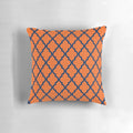 Moroccan-inspired navy blue and orange patterned decorative throw pillow