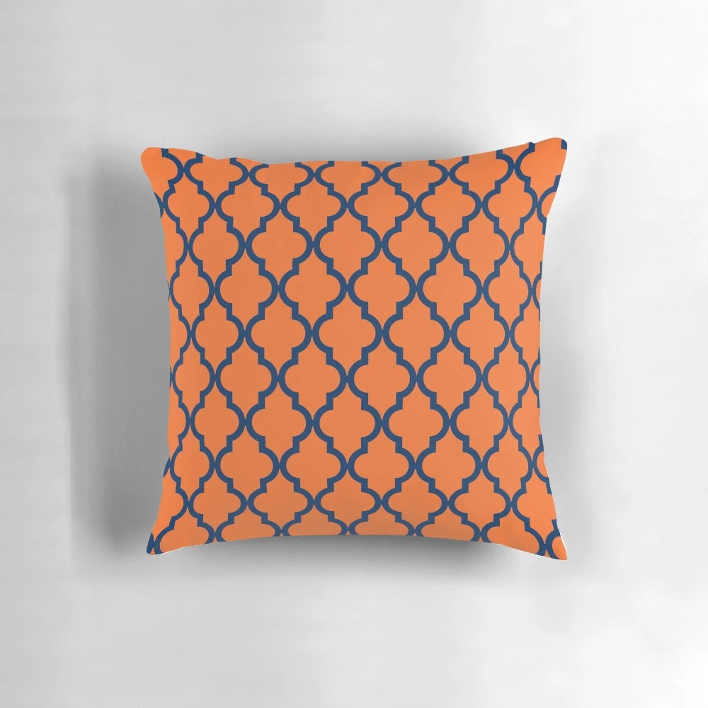 Moroccan-inspired navy blue and orange patterned decorative throw pillow