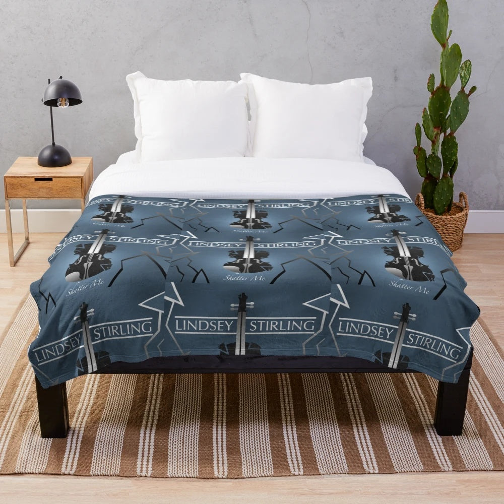 Music-themed plush blanket featuring a band logo design