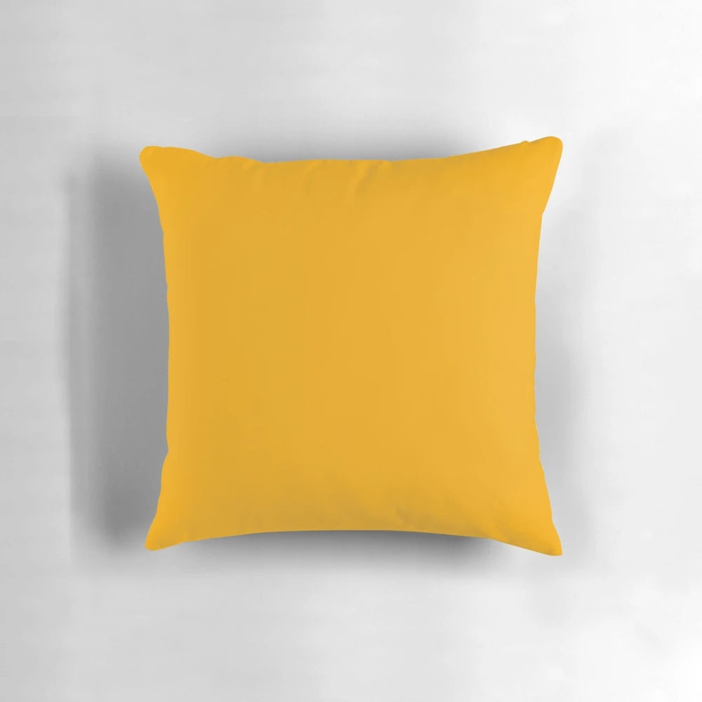 Mustard yellow decorative pillow with a minimalist, modern design