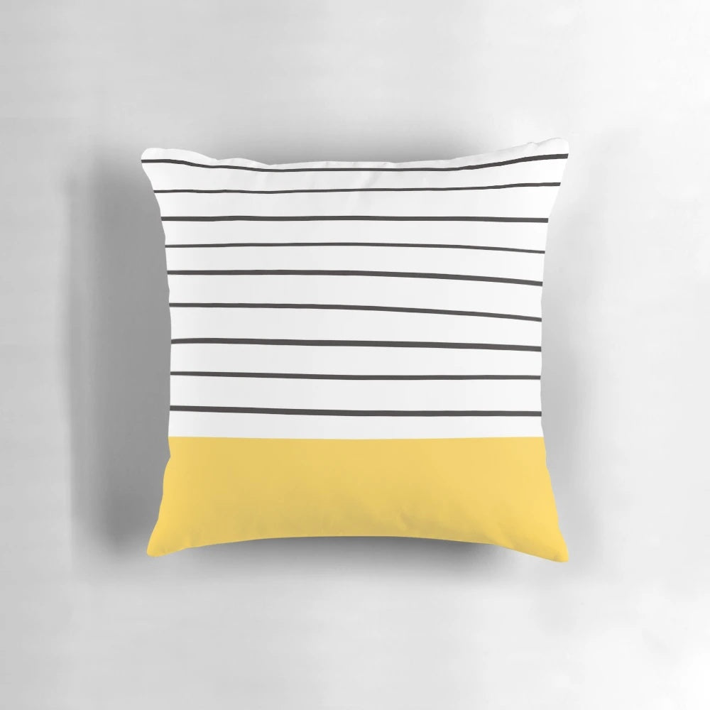 Mustard yellow and navy striped minimalist pillow with a modern, geometric design