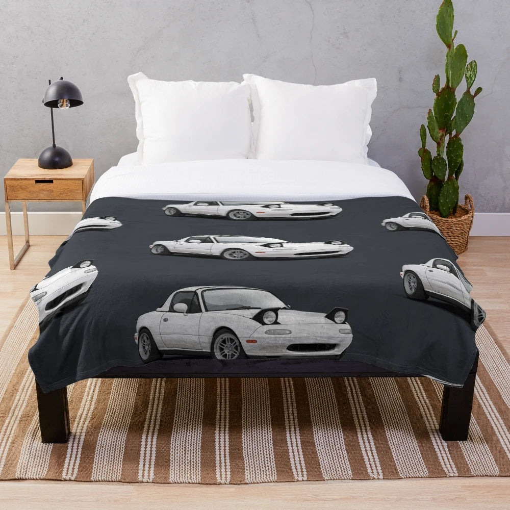 Cozy plush blanket featuring an illustration of a Mazda Mx5 / Miata NA MK1 sports car