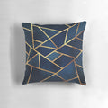Navy and gold geometric throw pillow with abstract triangular design