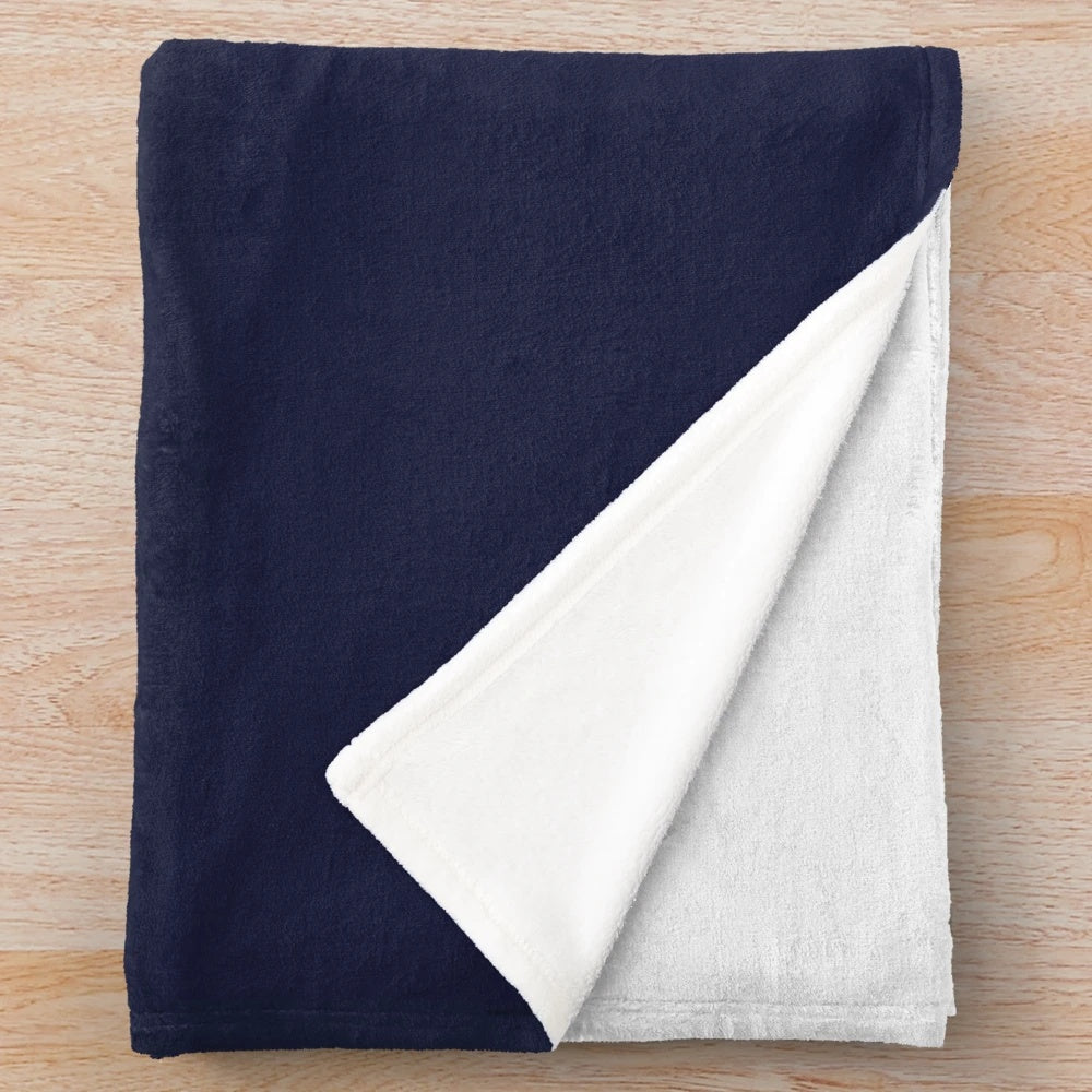 Navy and white striped plush blanket with a modern, minimalist design