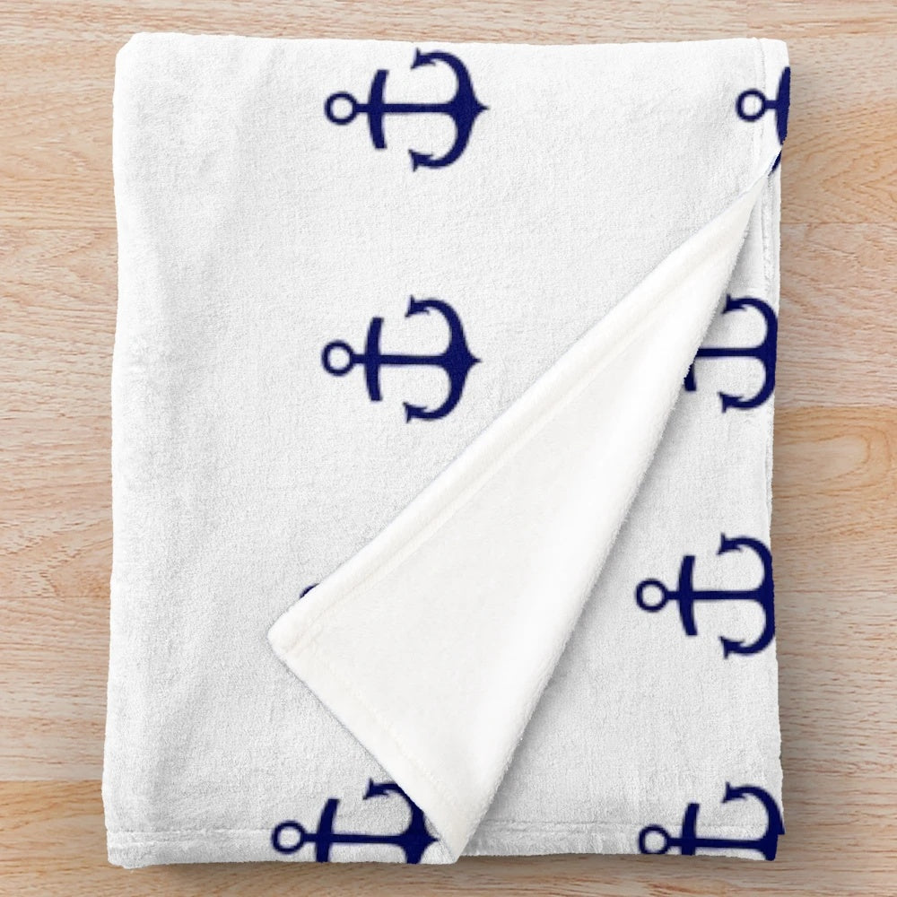 Navy blue plush blanket with anchor geometric pattern