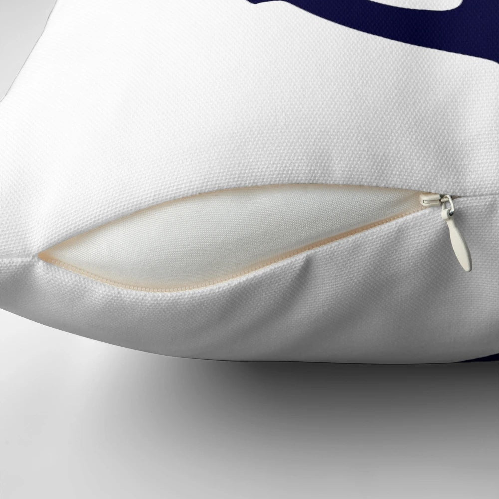 Navy blue anchor-themed pillow against a white background