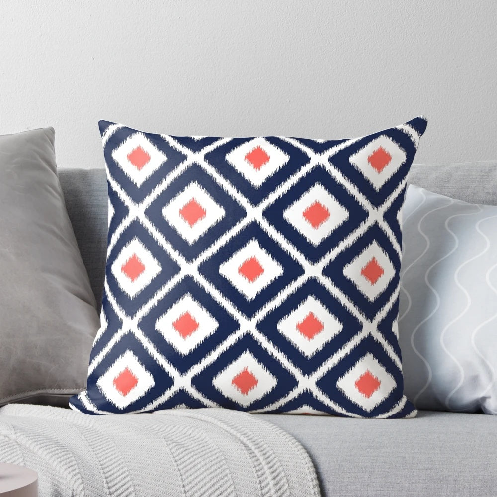 Navy blue and coral ikat diamond pattern decorative throw pillow