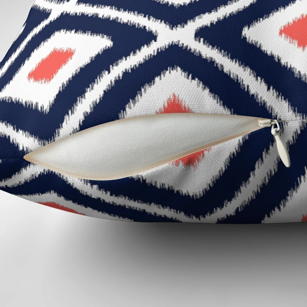 Navy blue and coral ikat diamond pattern decorative throw pillow