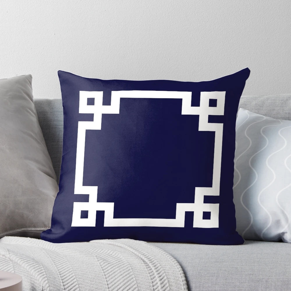Navy blue and white square decorative throw pillow with greek key pattern