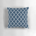 Navy blue pillow with a Moroccan quatrefoil design, perfect for modern home decor.