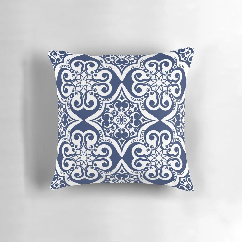 Navy blue pillow with a modern Moroccan tile pattern, perfect for adding a touch of classic style to any room.