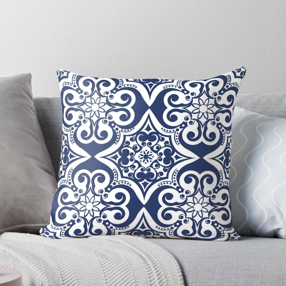 Navy blue pillow with a modern Moroccan tile pattern, perfect for adding a touch of classic style to any room.