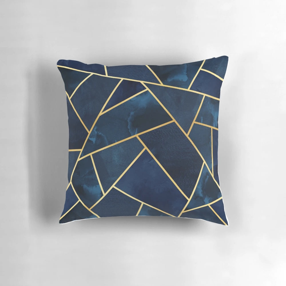 Navy and gold geometric patterned decorative throw pillow