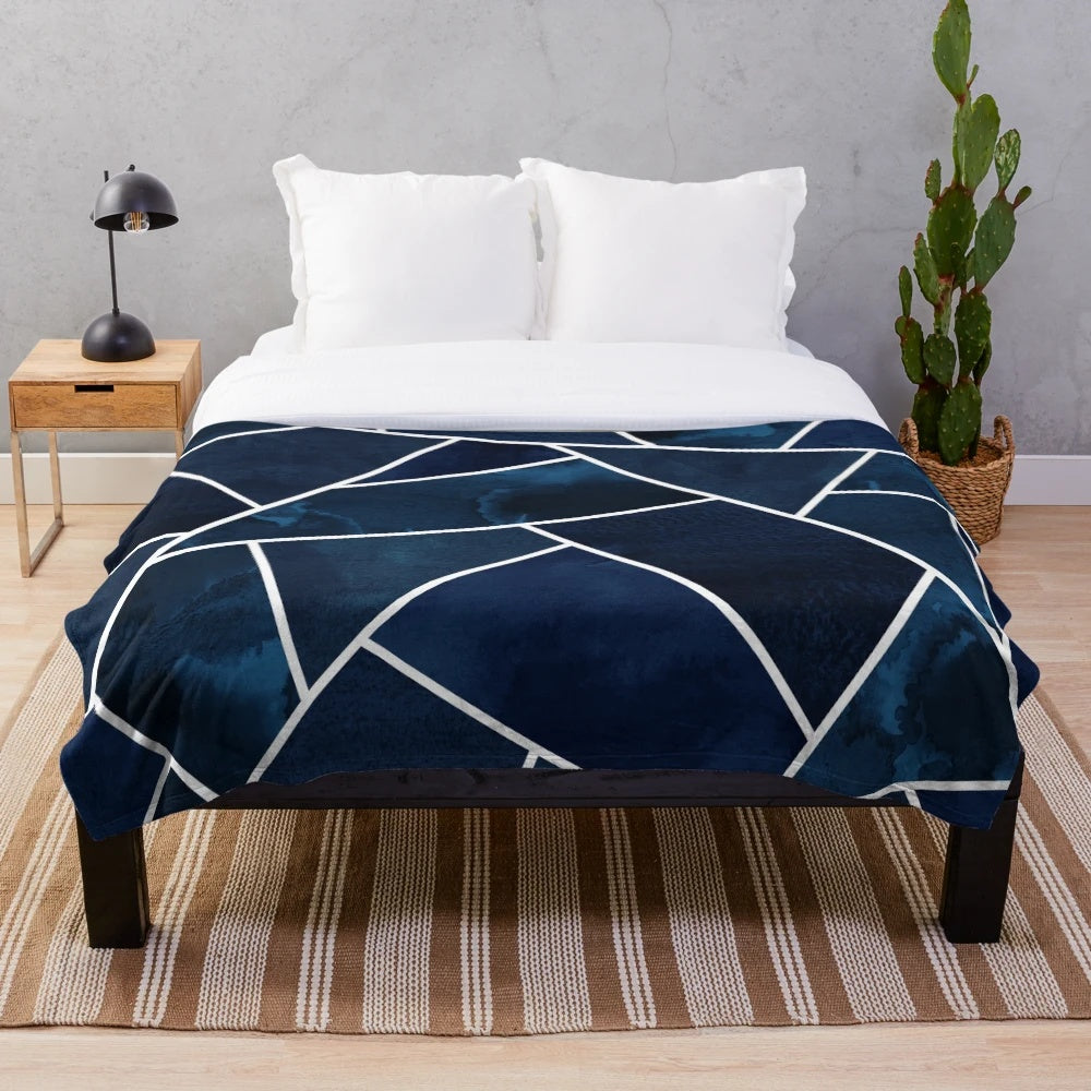Navy and white geometric pattern plush blanket