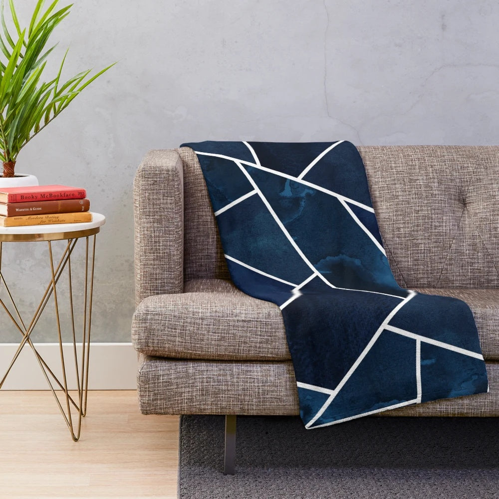 Navy and white geometric pattern plush blanket