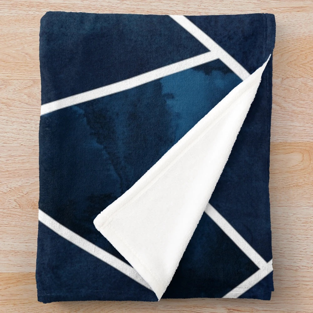 Navy and white geometric pattern plush blanket