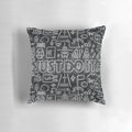 A white and black pillow featuring the iconic Nike "Just Do It" slogan in a cartoon-style design, perfect for adding motivation and style to any room.