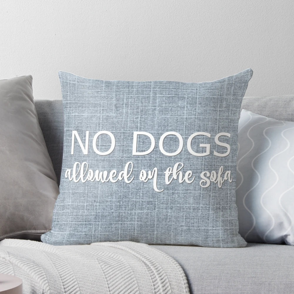 Grey and white decorative pillow with "No Dogs Allowed on the Sofa" printed on it, perfect for dog-themed home decor.