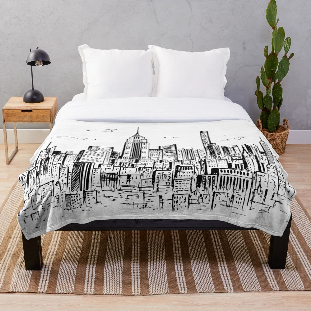Plush blanket featuring a hand-drawn illustration of the iconic New York City skyline