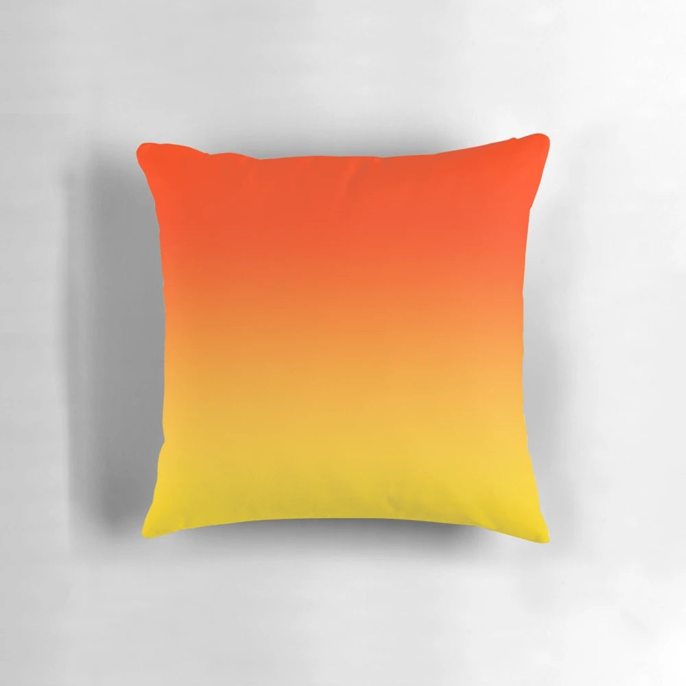 Vibrant ombre gradient pillow in orange, red and yellow tones