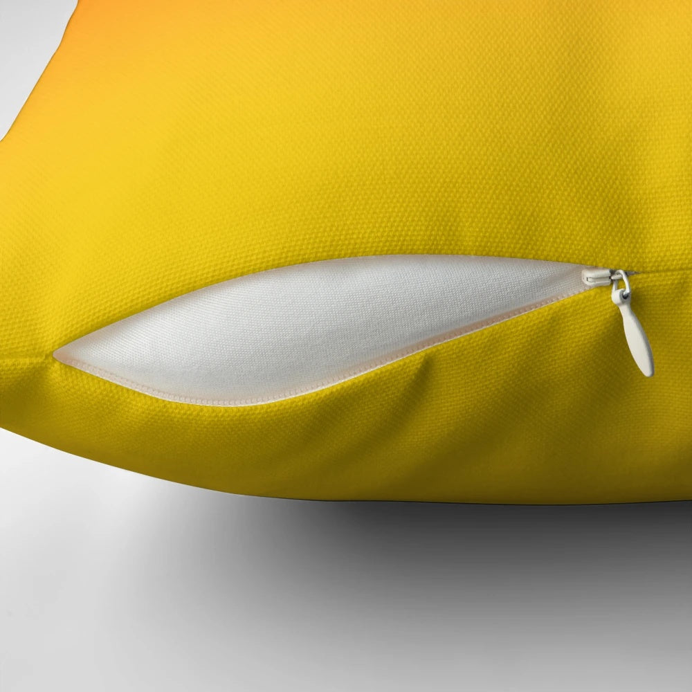 Vibrant ombre gradient pillow in orange, red and yellow tones