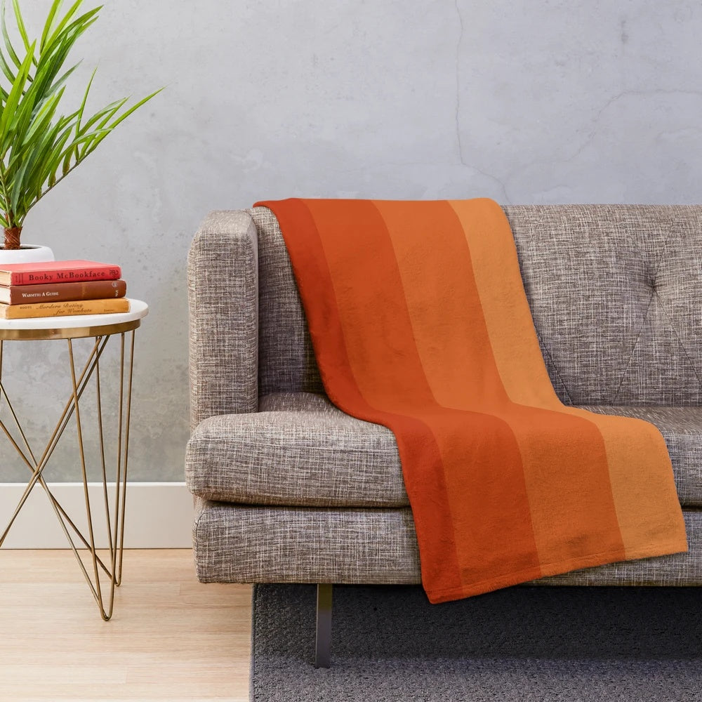 Burnt umber ombre plush blanket with geometric pattern
