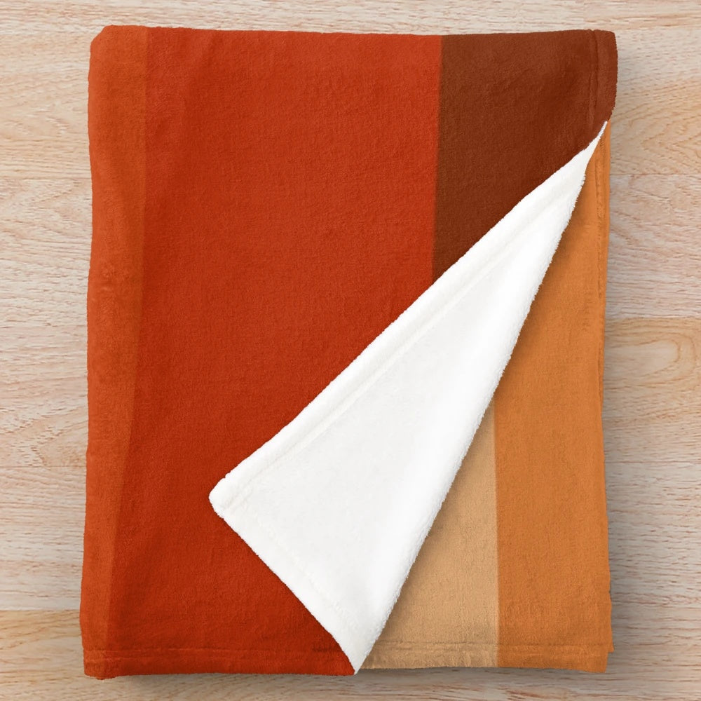 Burnt umber ombre plush blanket with geometric pattern