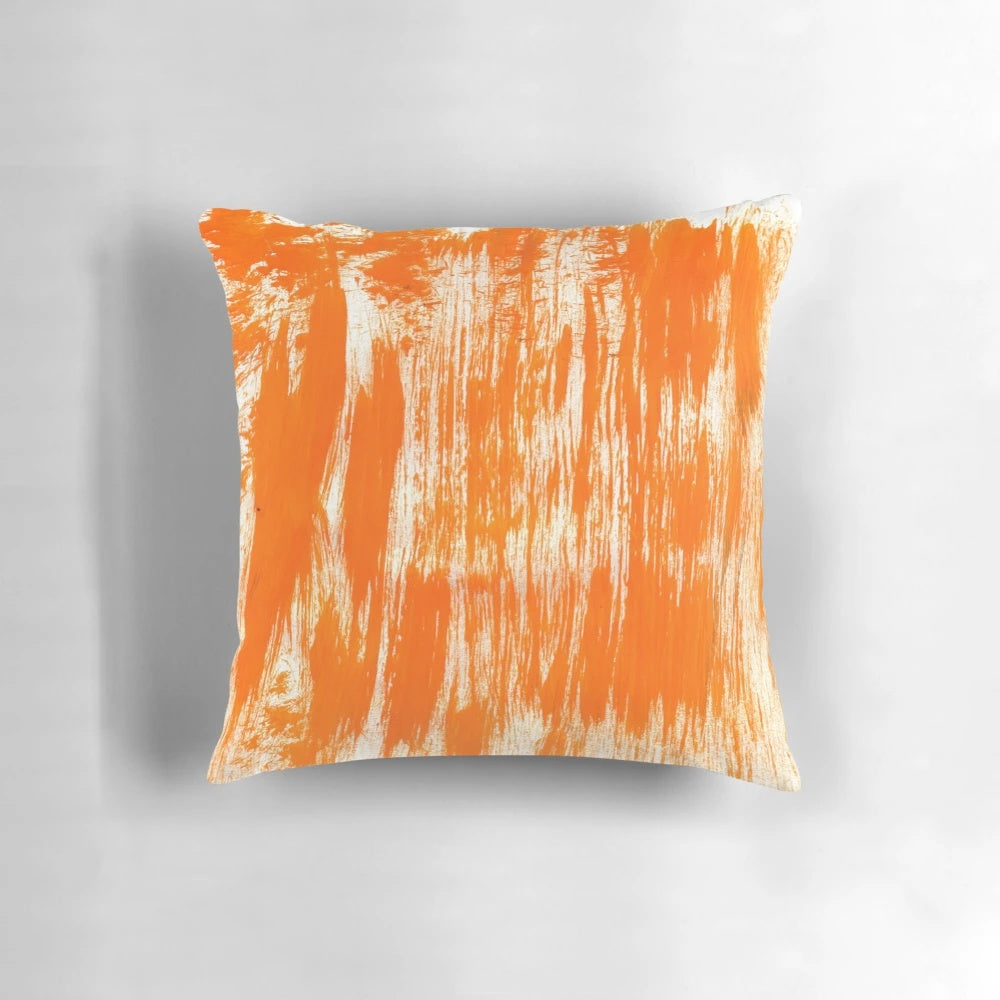 Orange paint brush splatter pattern decorative pillow