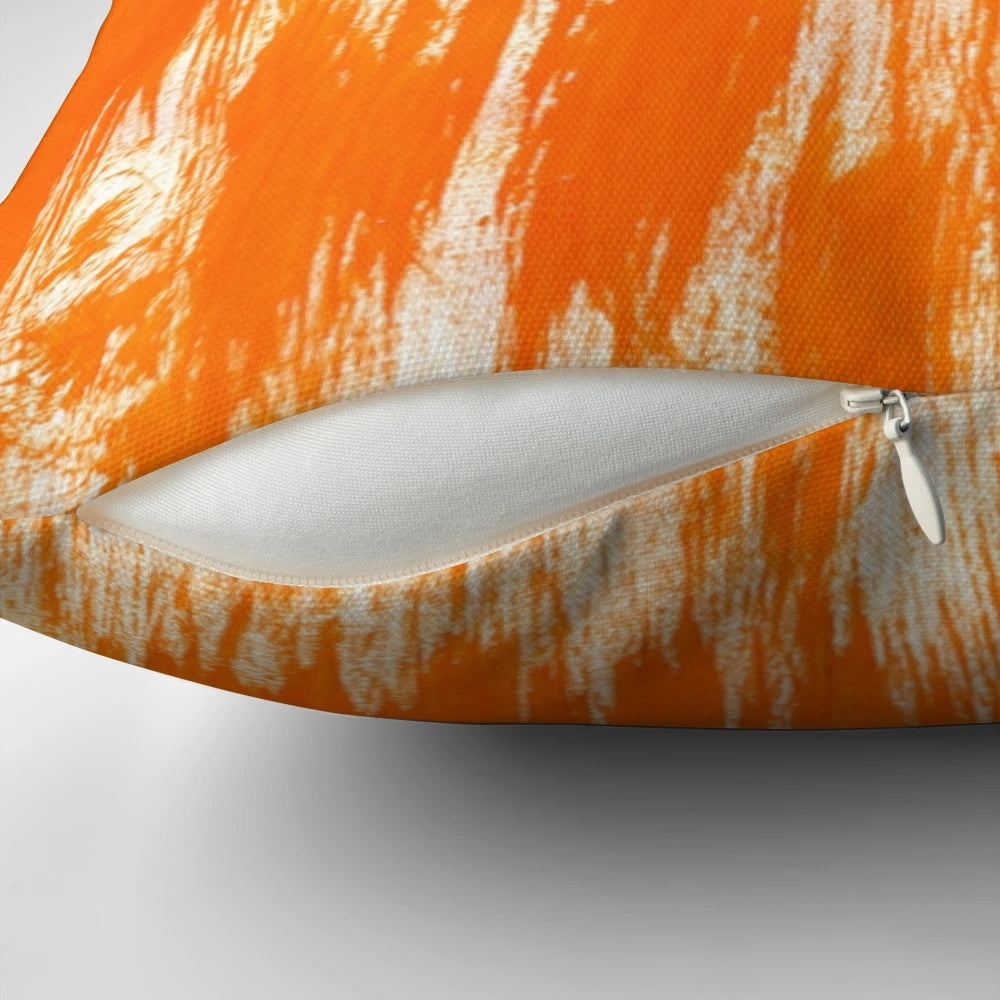 Orange paint brush splatter pattern decorative pillow
