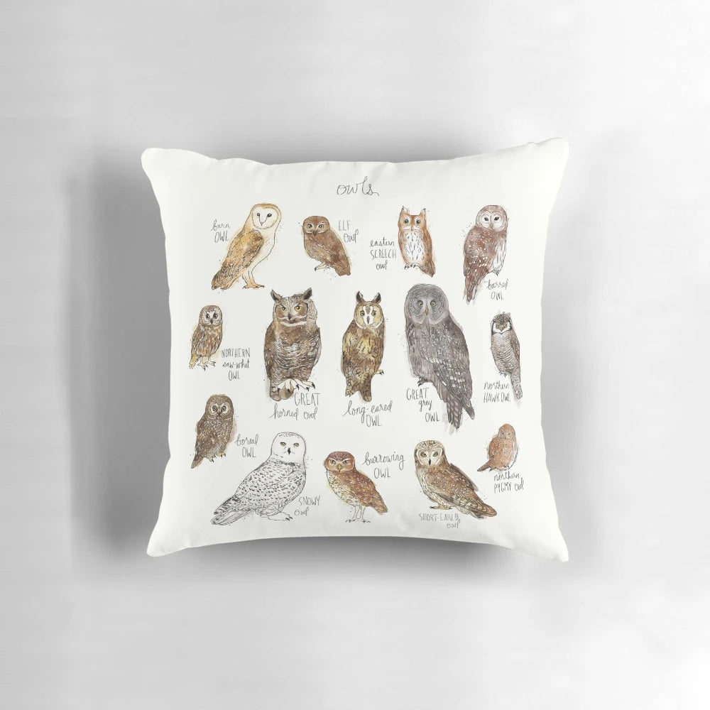 Decorative owl-themed pillow with a natural, forest-inspired design