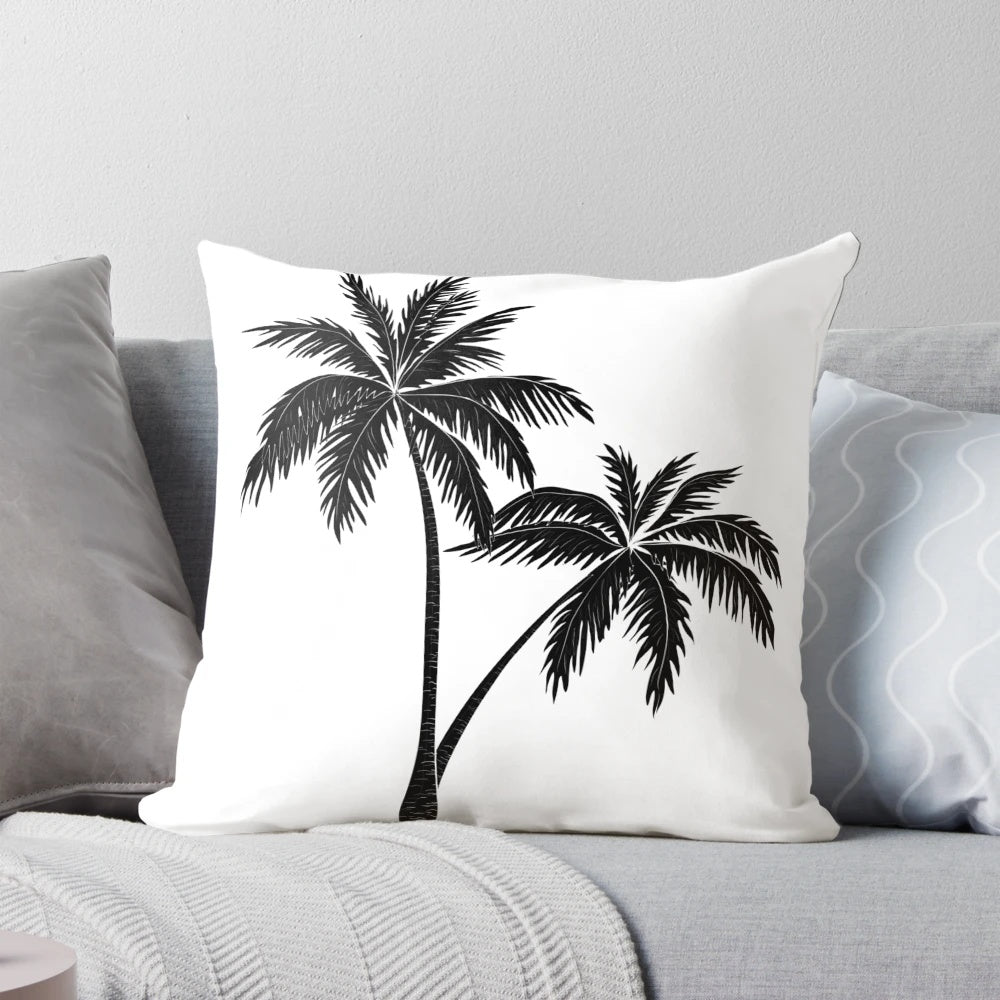 A monochrome palm tree design on a minimalist pillow
