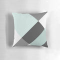 Patchwork pillow in a soothing grey and white color palette, featuring a modern and minimalist design.