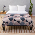 Pink and navy geometric pattern plush blanket