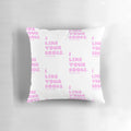 Whimsical pink pillow featuring the phrase "I like your boobs" in a playful font