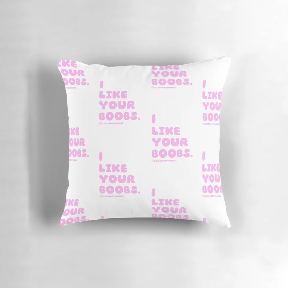 Whimsical pink pillow featuring the phrase "I like your boobs" in a playful font