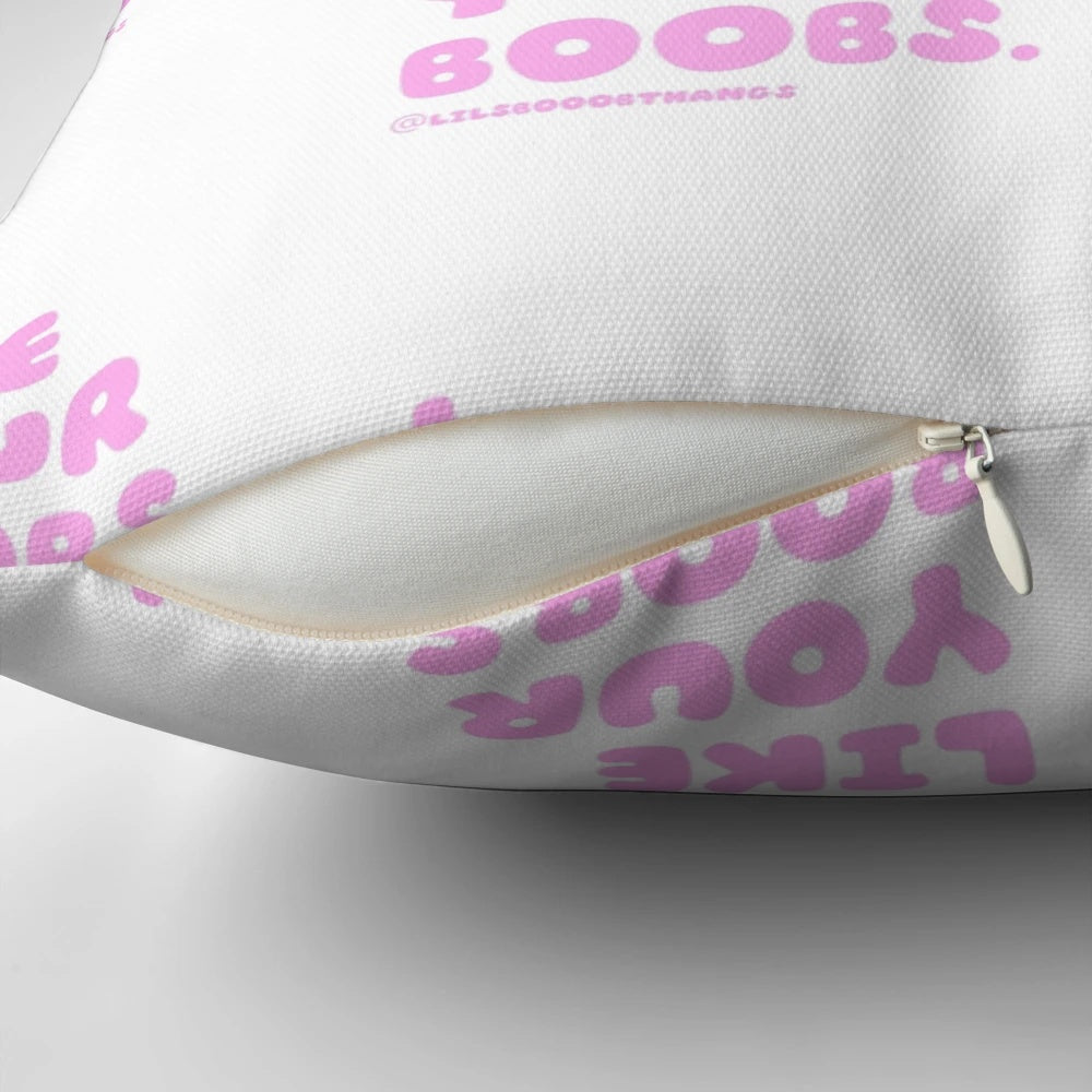 Whimsical pink pillow featuring the phrase "I like your boobs" in a playful font