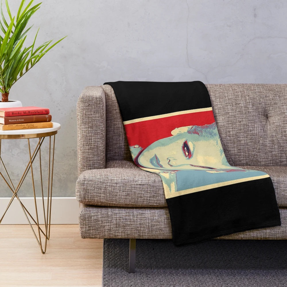 Pink plush blanket with a stylish design, perfect for music and pop culture fans