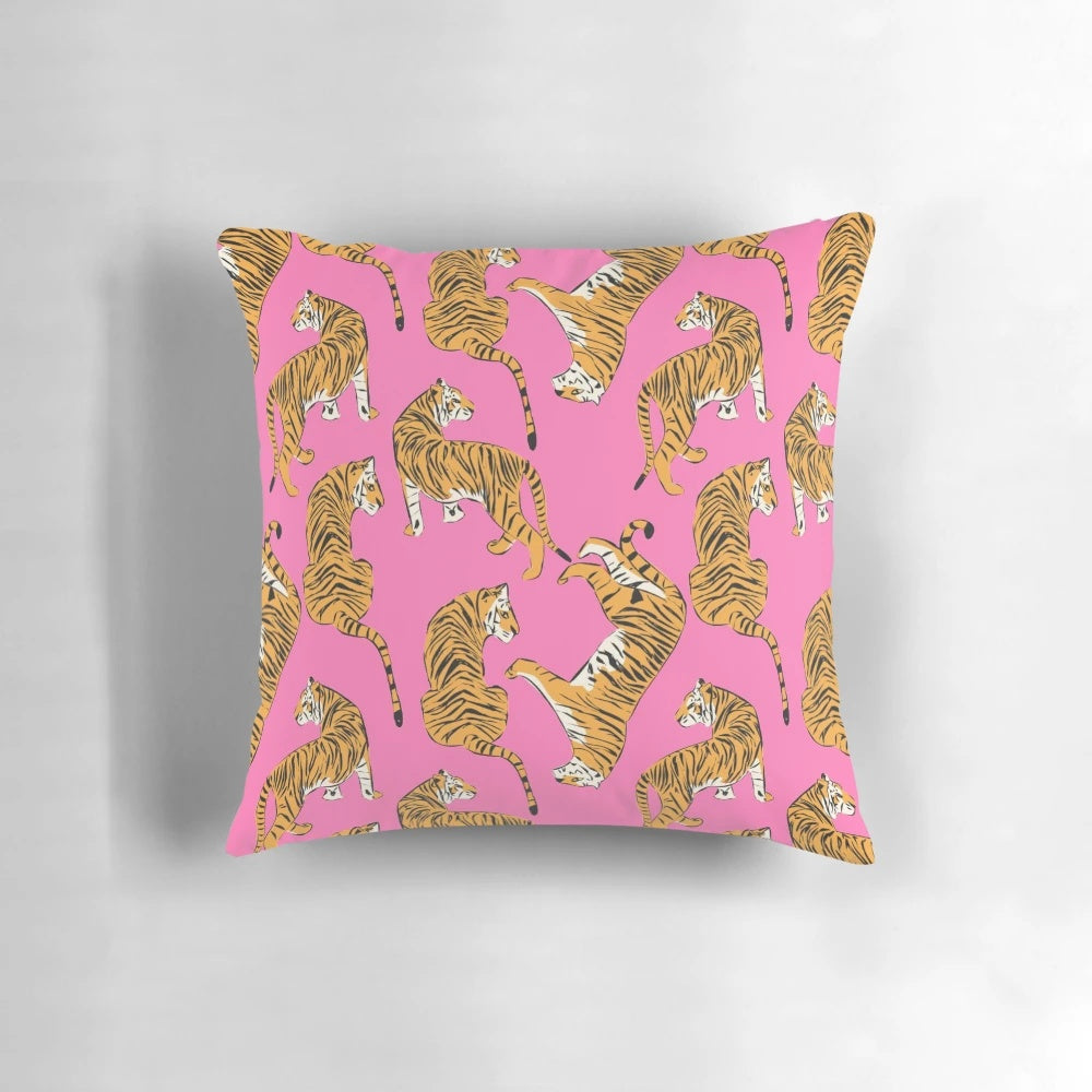 Decorative pink and white tiger print pillow with a preppy, contemporary design
