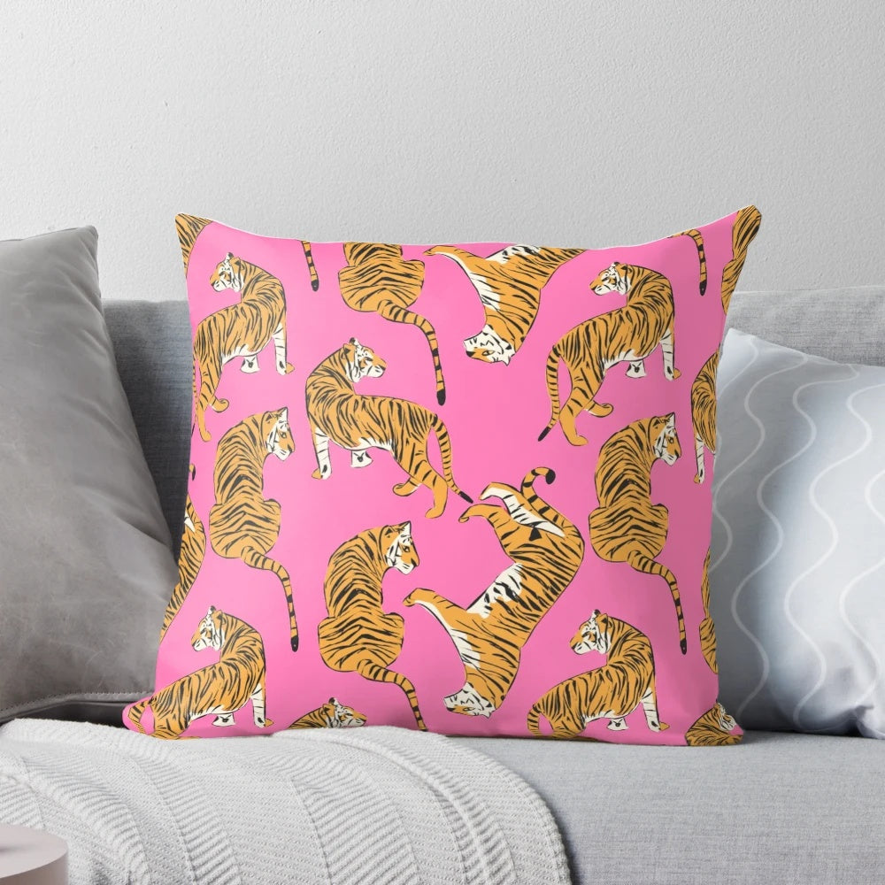 Decorative pink and white tiger print pillow with a preppy, contemporary design