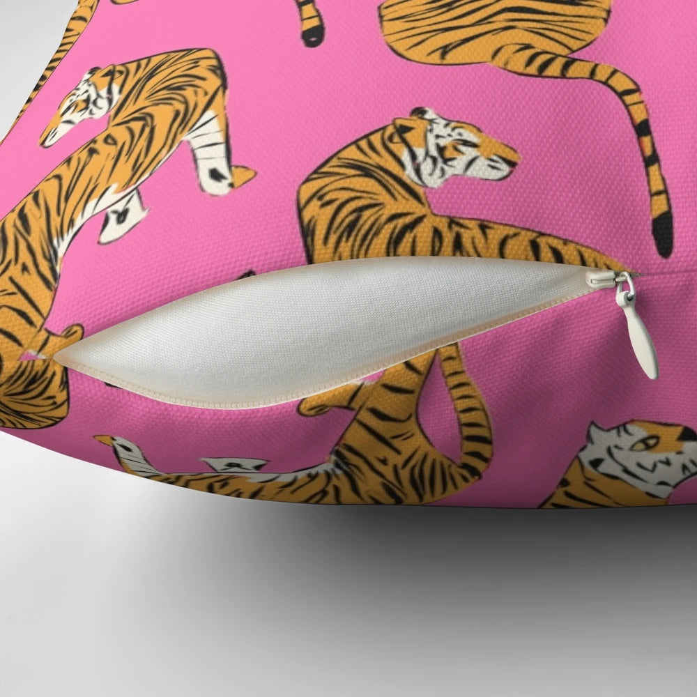 Decorative pink and white tiger print pillow with a preppy, contemporary design