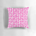 Soft, plush pink pillow with a delicate xoxo print design