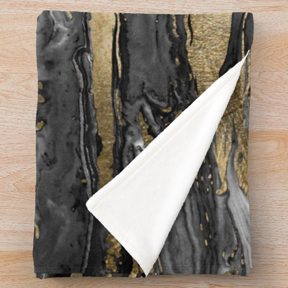 Stylish plush abstract marble blanket with gold and black design