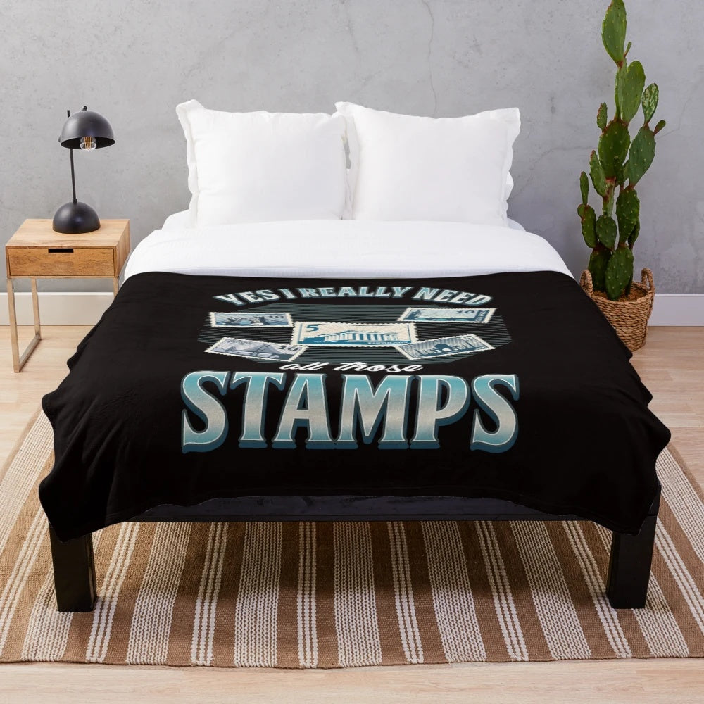 Plush blanket with vintage postage stamp design for stamp collectors and philatelists
