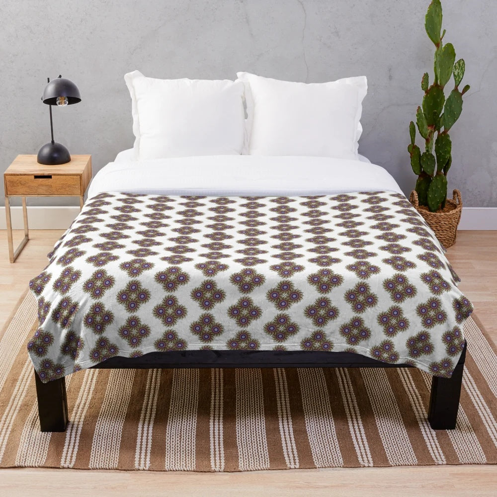 Soft, cozy plush blanket with a trendy, symmetrical designer pattern