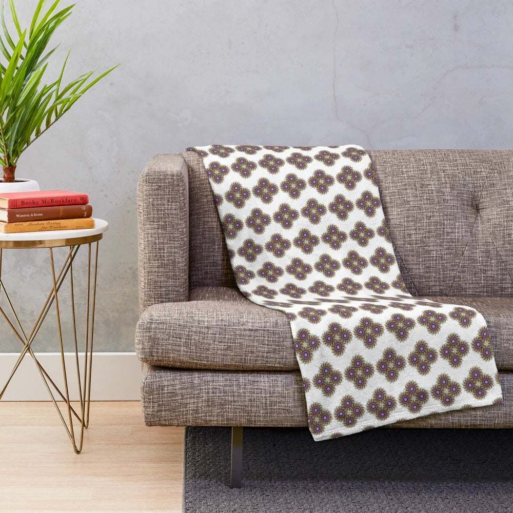 Soft, cozy plush blanket with a trendy, symmetrical designer pattern