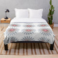 Plush blanket with a vibrant, symmetrical pattern