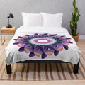 Stylish plush blanket with a symmetrical designer pattern