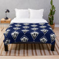 Plush disc golf themed blanket with geometric mountain design